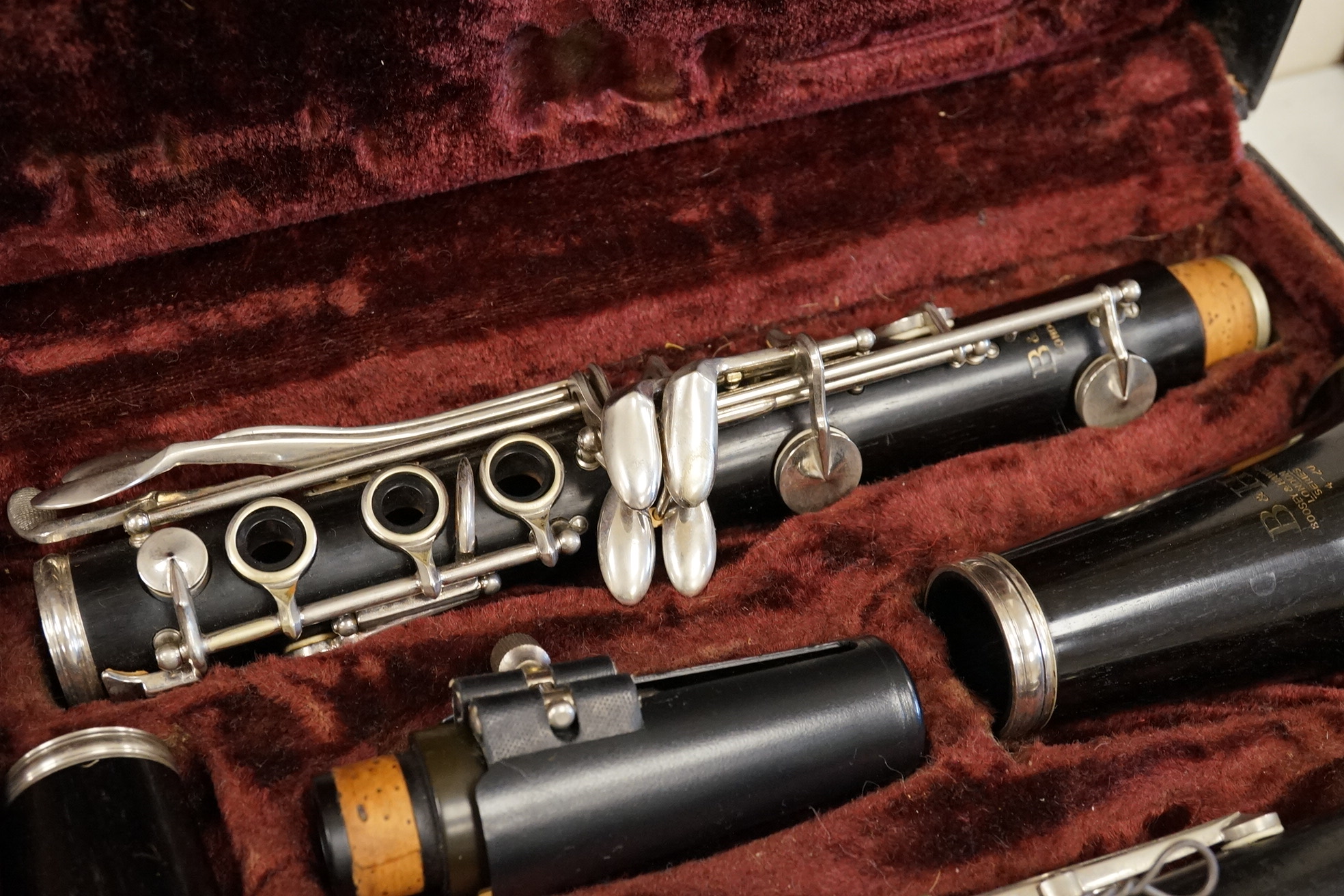 A 19th century violin, and a cased Boosey & Hawkes clarinet
